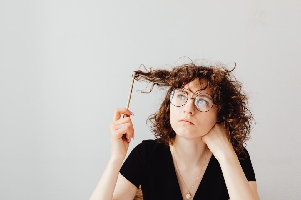 Do I need self-help or professional help? Woman Questioning 1024x683